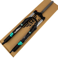 Thumbnail for Top-down view of the 27.5-inch suspension forks inside the packaging box